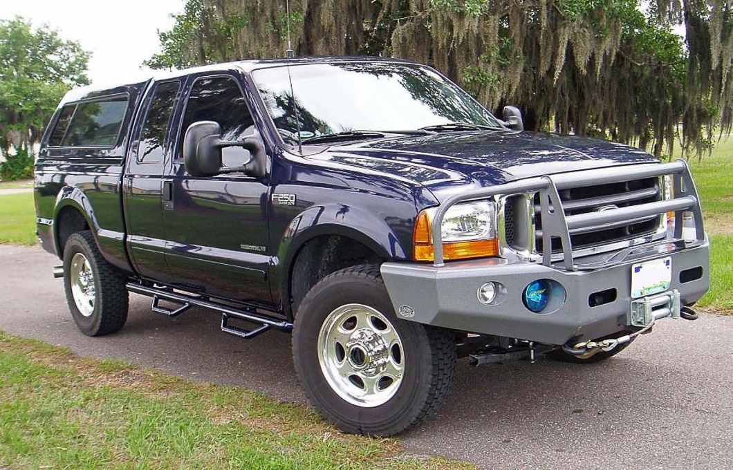 2011-2016-f250-with-bed-cap-and-aftermarket-bumper.JPG