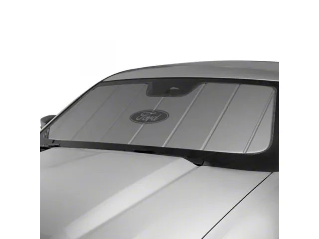 Custom-fit reflective windshield sunshade installed on a Ford F-150, designed to reduce heat buildup and protect the interior from UV exposure.