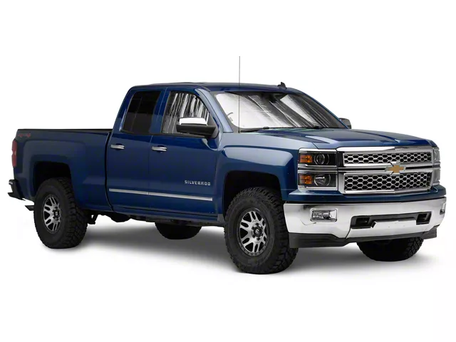 Blue Chevrolet Silverado equipped with custom-fit reflective window sunshades installed across the windshield and side windows to help keep the cabin cool