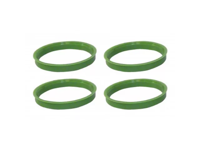Set of four green hub-centric rings used to ensure proper wheel centering on aftermarket wheels and reduce vibration.