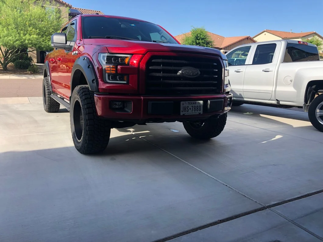 Lifted Red Truck on Big Wheels