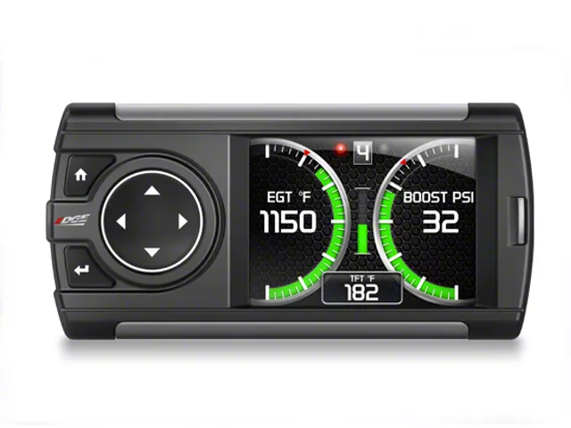 Edge Evolution performance tuner mounted inside a Ford F-150, displaying real-time engine gauges and vehicle performance data on its color screen.