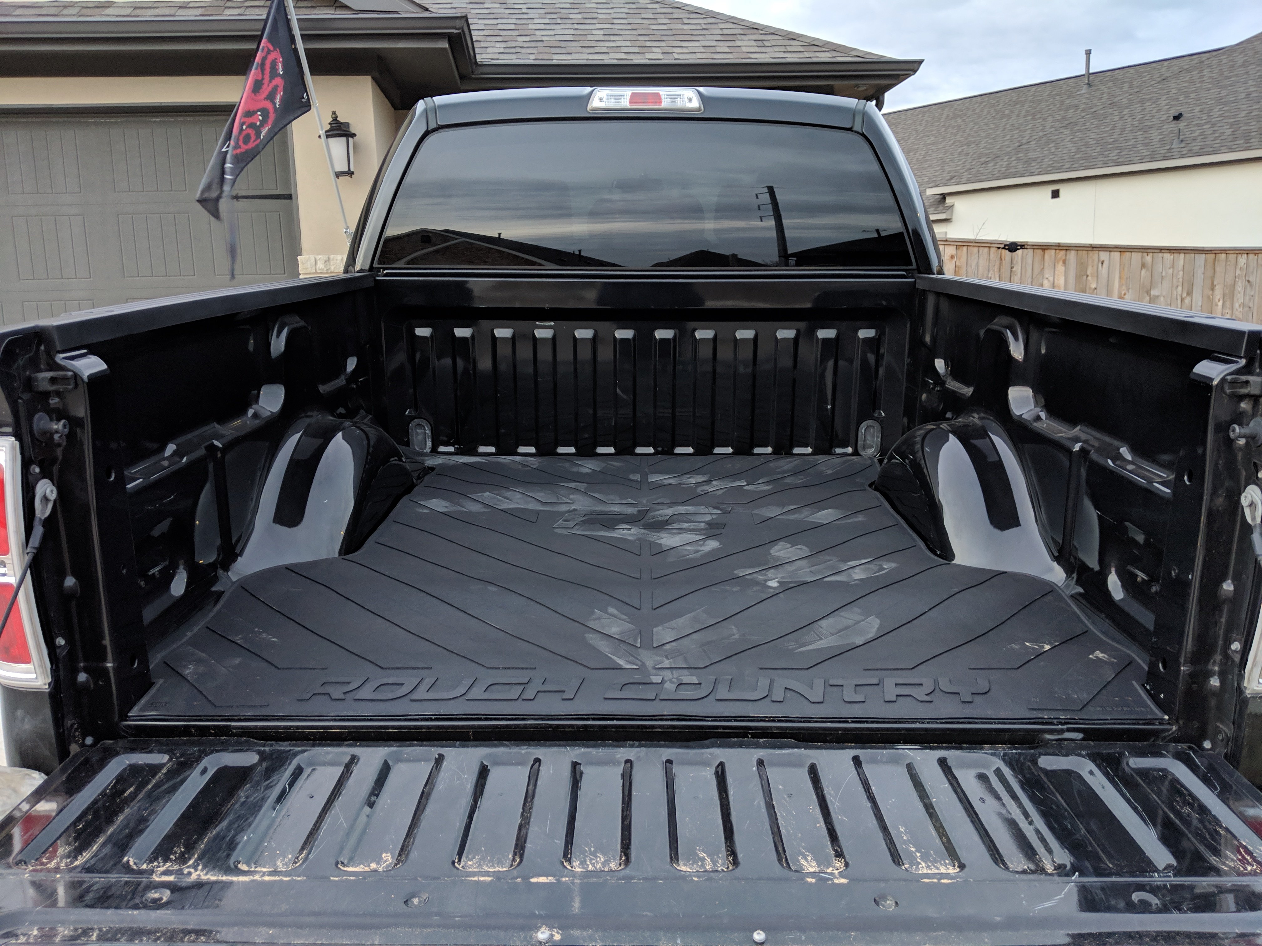 Different types of truck bed liners including rubber, carpet, and roll-on options