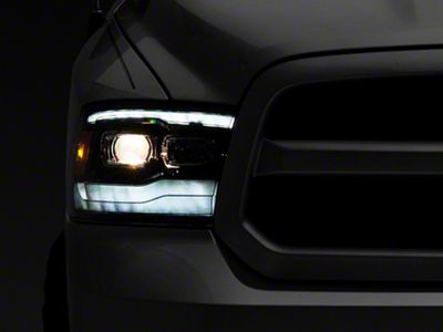 PRO-Series Projector Headlights; Jet Black Housing; Clear Lens (13-18 RAM 1500 w/ Factory Projector Headlights)