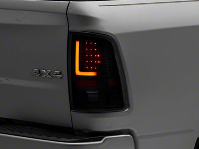 L-Bar LED Tail Lights; Black Housing; Clear Lens (09-18 RAM 1500 w/ Factory Halogen Tail Lights)