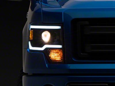 Raxiom Axial Series Projector Headlights with LED Light Bar; Black Housing; Clear Lens (09-14 F-150 w/ Factory Halogen Headlights)