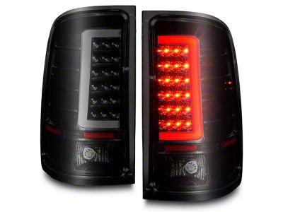 Raxiom Axial Series C-Tube LED Tail Lights; Black Housing; Smoked Lens (07-14 Sierra 3500 HD SRW)