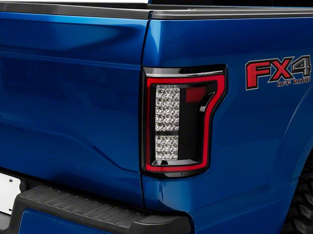 Raxiom LED Tail Lights; Black Housing; Clear Lens (15-17 F-150 w/ Factory Halogen Non-BLIS Tail Lights)
