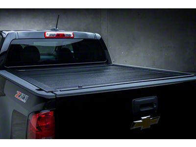 Pace Edwards Full Metal JackRabbit Retractable Bed Cover with Explorer Rails; Gloss Black (99-18 Silverado 1500)