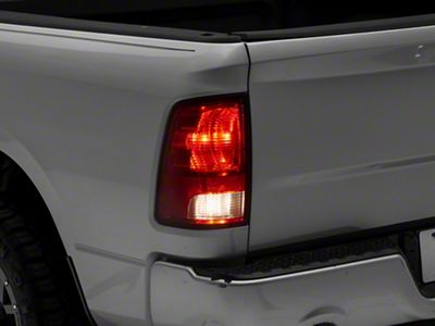 OEM Style Tail Light; Chrome Housing; Red/Clear Lens; Driver Side (09-18 RAM 1500 w/ Factory Halogen Tail Lights)