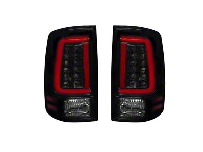 OLED Tail Lights; Black Housing; Smoked Lens (13-18 RAM 1500 w/ Factory LED Tail Lights)