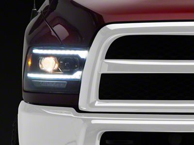 Pro-Series 5th Gen 2500 G2 Style Projector Headlights; Black Housing; Clear Lens (13-18 RAM 1500 w/ Factory Halogen Projector Headlights)