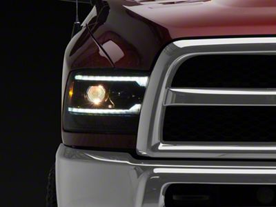 Pro-Series 5th Gen 2500 G2 Style Projector Headlights; Alpha Black Housing; Clear Lens (13-18 RAM 1500 w/ Factory Halogen Projector Headlights)