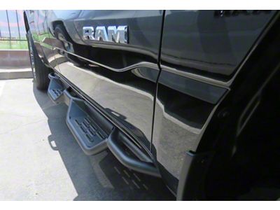 Round Tube Drop Style Nerf Side Step Bars; Black (19-25 RAM 1500 Quad Cab)