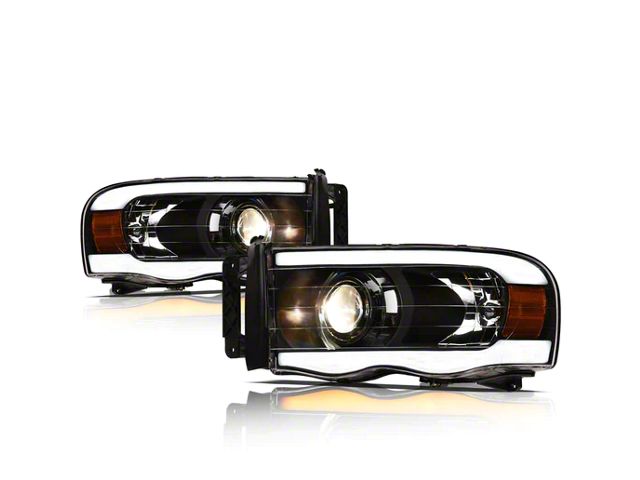 SQP Series Projector Headlights with Sequential Turn Signals; Black Housing; Clear Lens (02-05 RAM 1500)