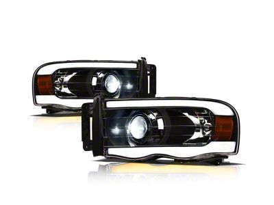 SQX Series LED Projector Headlights with Sequential Turn Signals; Black Housing; Clear Lens (02-05 RAM 1500)