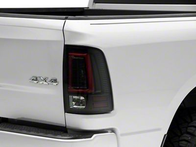 OLED Tail Lights with Scanning Turn Signals; Black Housing; Smoked Lens (10-18 RAM 3500 w/ Factory Halogen Tail Lights)