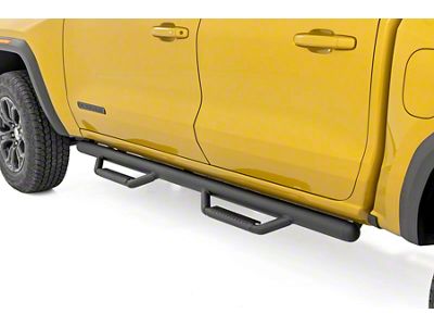 Rough Country Cab Length Nerf Side Step Bars; Black (15-24 Canyon Crew Cab)