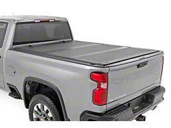 Rough Country Hard Tri-Fold Flip-Up Tonneau Cover (20-25 Sierra 2500 HD w/ 6.90-Foot Standard Box & Rail Caps)
