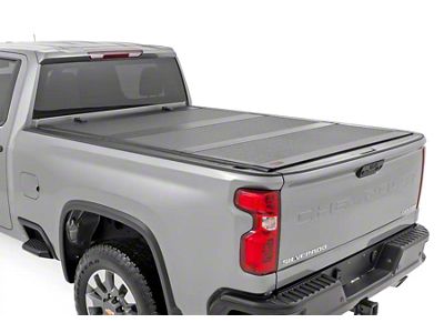 Rough Country Hard Tri-Fold Flip-Up Tonneau Cover (20-25 Sierra 3500 HD w/ 6.90-Foot Standard Box & Rail Caps)