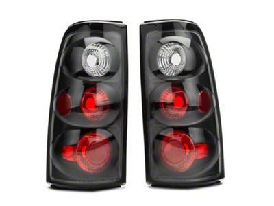 Altezza Tail Lights; Matte Black Housing; Clear Lens (04-06 Sierra 1500 Fleetside)