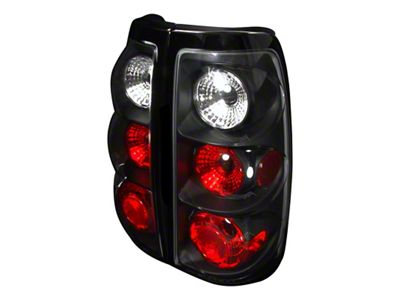 Altezza Tail Lights; Matte Black Housing; Clear Lens (99-02 Sierra 1500 Fleetside)