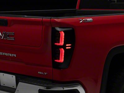 OLED Tail Lights; Chrome Housing; Smoked Lens (19-24 Sierra 1500 w/ Factory LED Tail Lights)