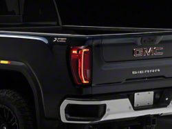 OEM Style Tail Light; Black Housing; Red/Clear Lens; Driver Side (20-23 Sierra 3500 HD w/ Factory LED Tail Lights)