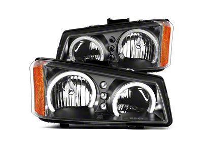 Raxiom Dual LED Halo Projector Headlights; Black Housing; Clear Lens (03-06 Silverado 1500)