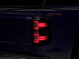 Raxiom LED Tail Lights with Sequential Turn Signals; Black Housing; Clear Lens (14-18 Silverado 1500 w/ Factory Halogen Tail Lights)