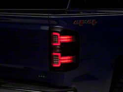 Raxiom LED Tail Lights with Sequential Turn Signals; Black Housing; Clear Lens (14-18 Silverado 1500 w/ Factory Halogen Tail Lights)