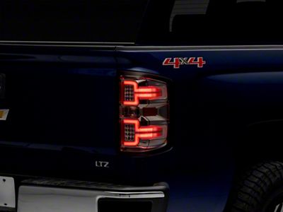 Raxiom LED Tail Lights with Sequential Turn Signals; Chrome Housing; Clear Lens (14-18 Silverado 1500 w/ Factory Halogen Tail Lights)