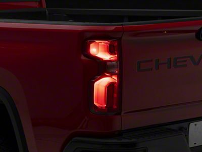 OEM Style Tail Light; Black Housing; Red/Clear Lens; Driver Side (19-23 Silverado 1500 w/ Factory LED Tail Lights)