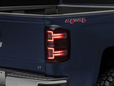 Sequential LED Tail Lights; Black Housing; Clear Lens (14-18 Silverado 1500 w/ Factory Halogen Tail Lights)