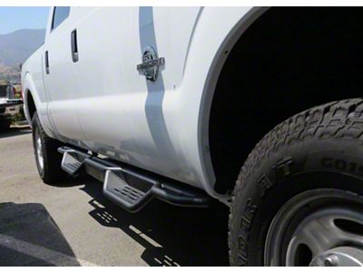 Round Tube Drop Style Nerf Side Step Bars; Black (11-16 F-250 Super Duty SuperCrew)