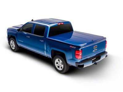 UnderCover SE Smooth Hinged Tonneau Cover; Unpainted (07-13 Sierra 1500 w/ 6.50-Foot Standard Box)