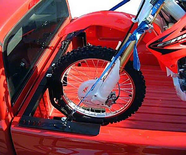 Ford F150 Dirt Bikes In A Truck Bed Buddy Motorcycle Tie Down - Main Image