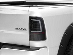 Raxiom Axial Series LED Tail Lights; Black Housing; Clear Lens (09-18 RAM 1500 w/ Factory Halogen Tail Lights)