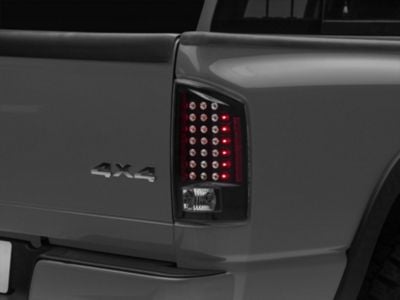 Raxiom LED Tail Lights; Black Housing; Clear Lens (07-08 RAM 1500)