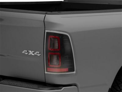 Raxiom LED Tail Lights; Black Housing; Clear Lens (09-18 RAM 1500 w/ Factory Halogen Tail Lights)