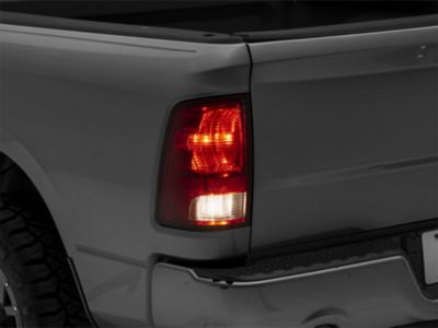 OEM Style Tail Light; Chrome Housing; Red/Clear Lens; Driver Side (09-18 RAM 1500 w/ Factory Halogen Tail Lights)