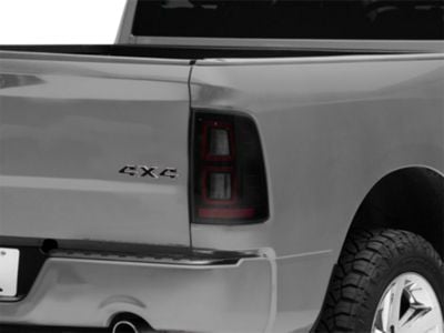 Raxiom LED Tail Lights; Black Housing; Light Smoked Lens (09-18 RAM 1500 w/ Factory Halogen Tail Lights)